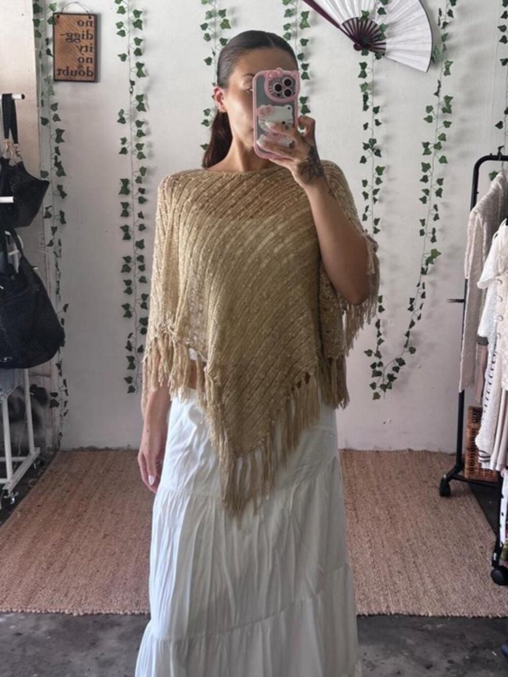 NY&C tan fringe knit poncho with an asymmetrical hem one size